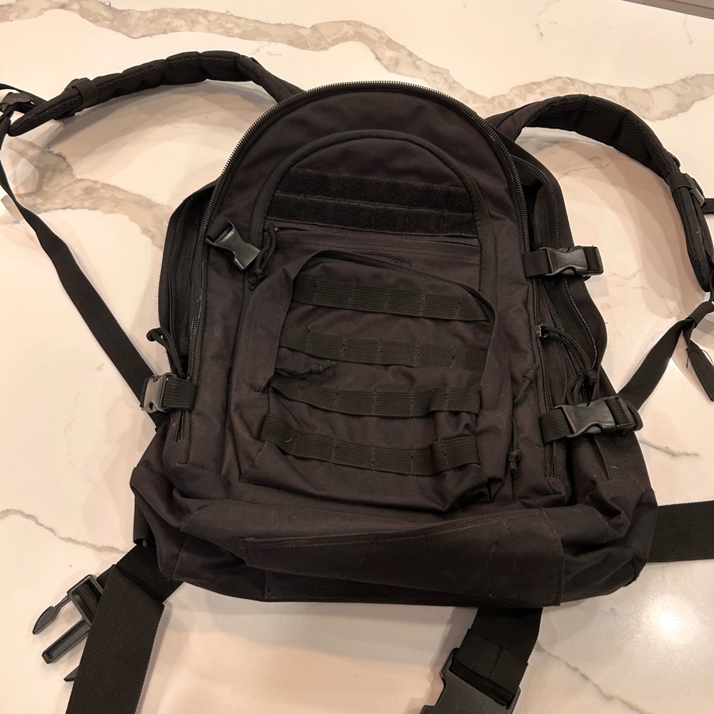 Black Tactical Backpack with MOLLE System and Adjustable Straps